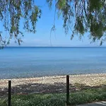 Сasa de vacaciones Eva's Beachfront House Cos
